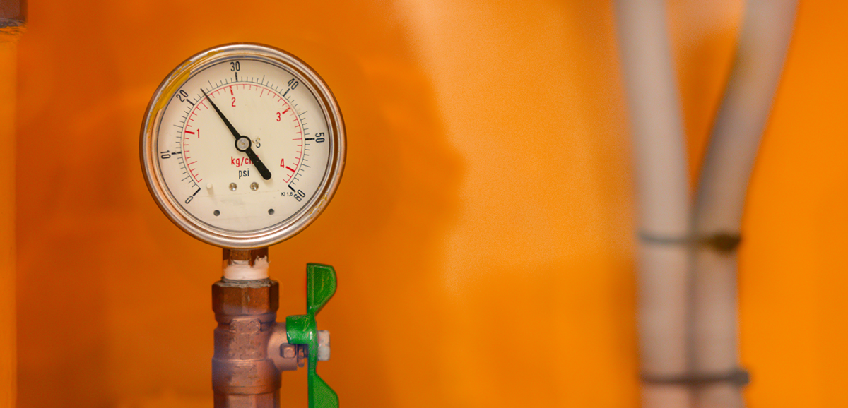 A Close up of an gas meter dial.